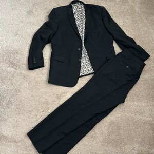 Ted Baker London Men’s modern fit suit. Jacket and pants in Black